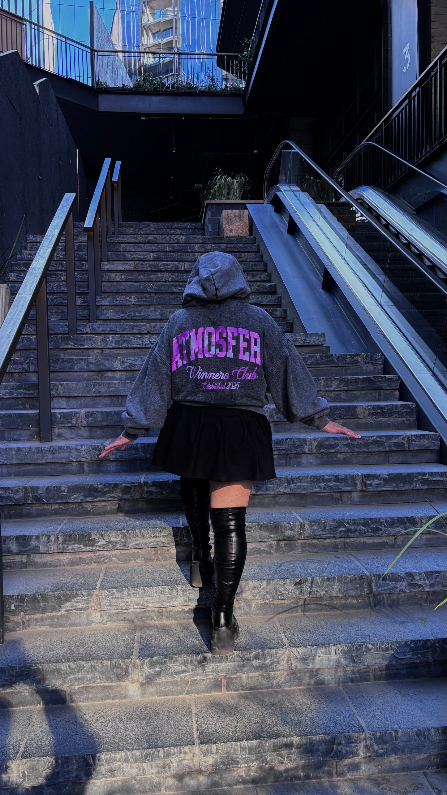 Poleron Boxy Fit Atmosfera Winners Club Grabillado